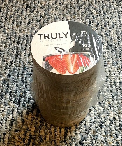 Truly spiked sparkling water - &,